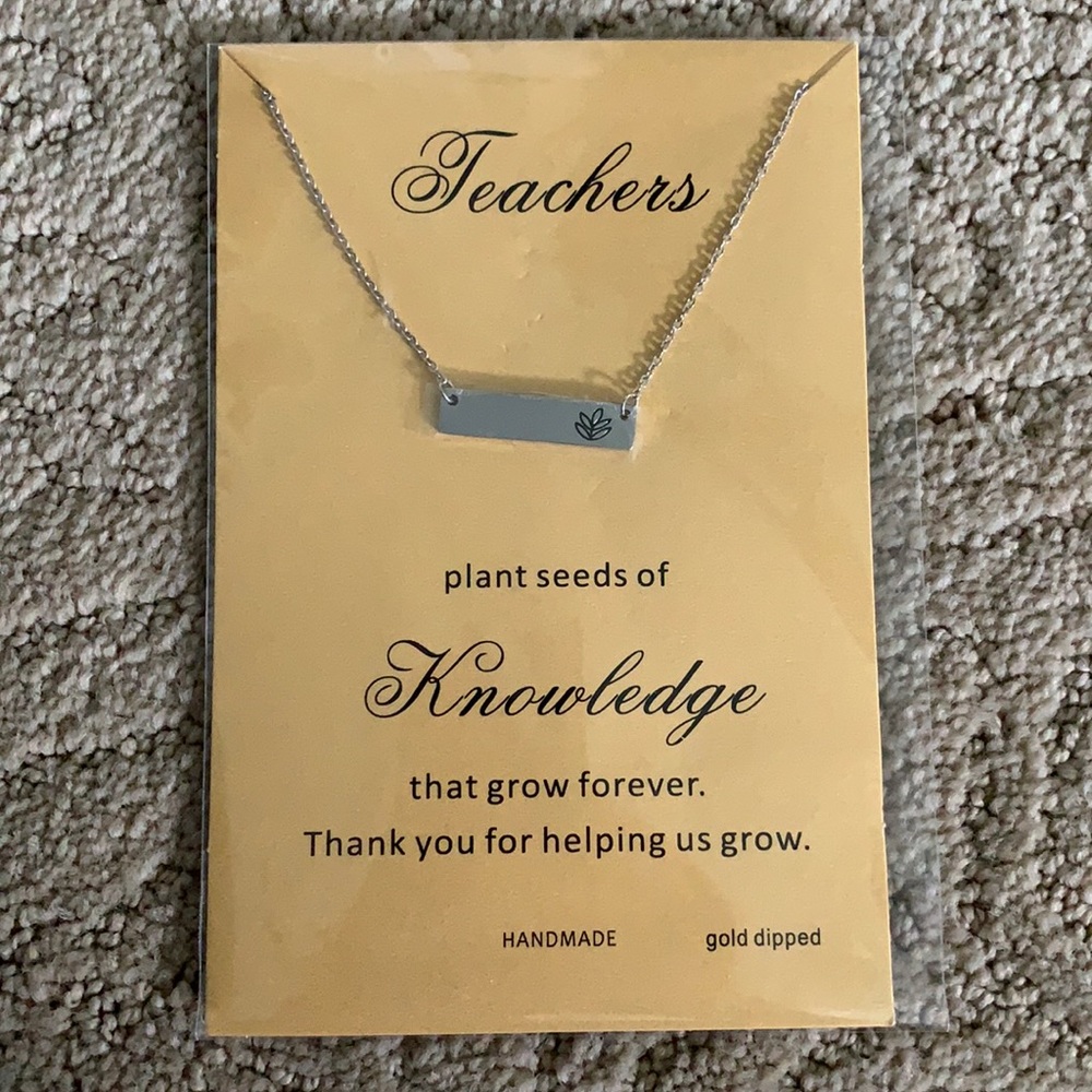 Teachers plant sees of knowledge necklace